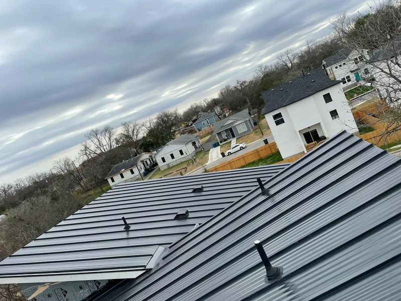 Standing seam metal roof panels with vents for Skylight Repair in Elm Grove